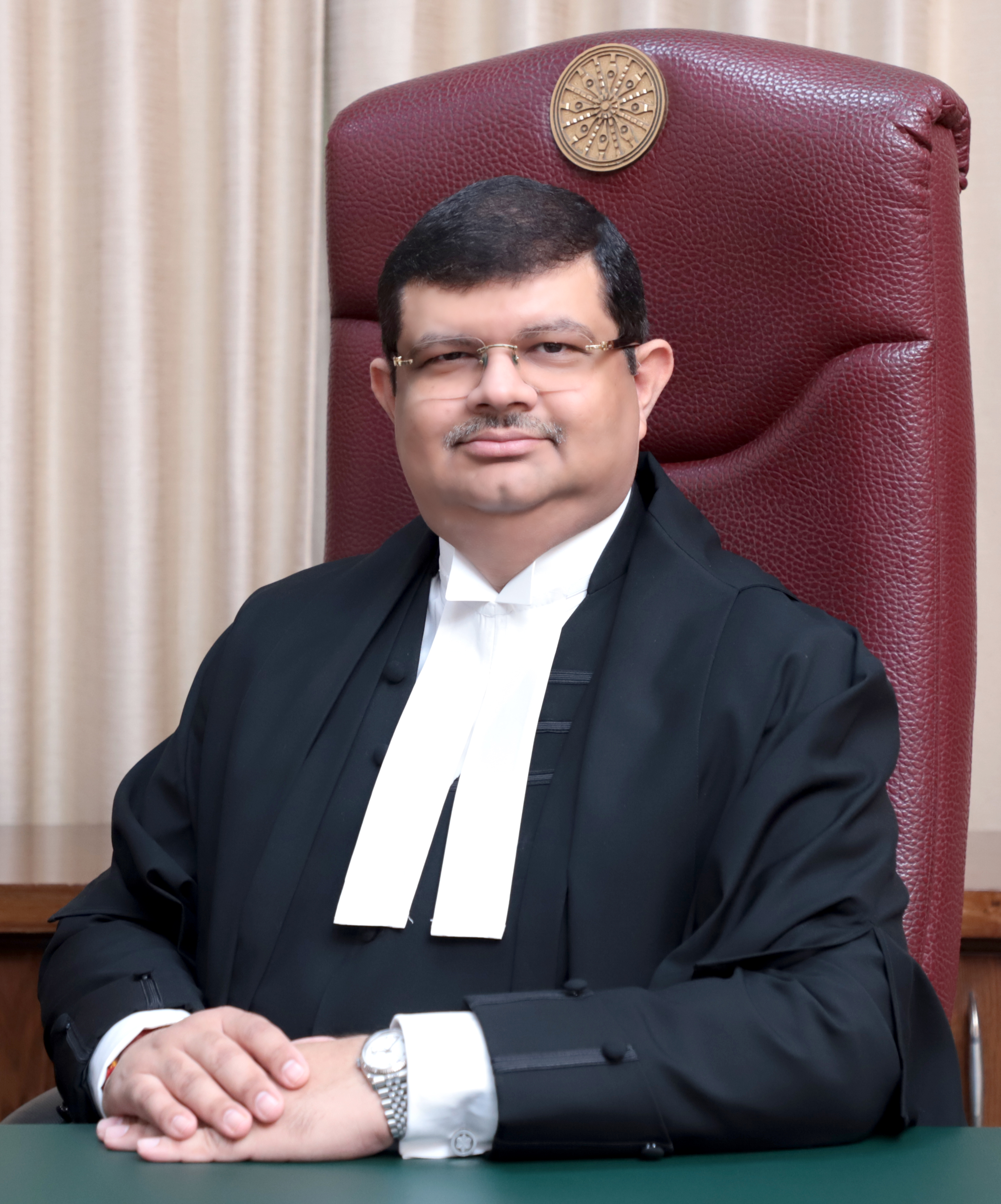 Justice Tejas Karia